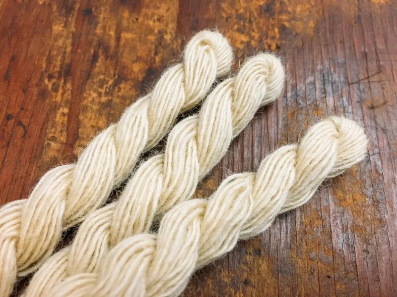 Single plies of yarn. Two of these plies will be combined to make our two-ply yarn.